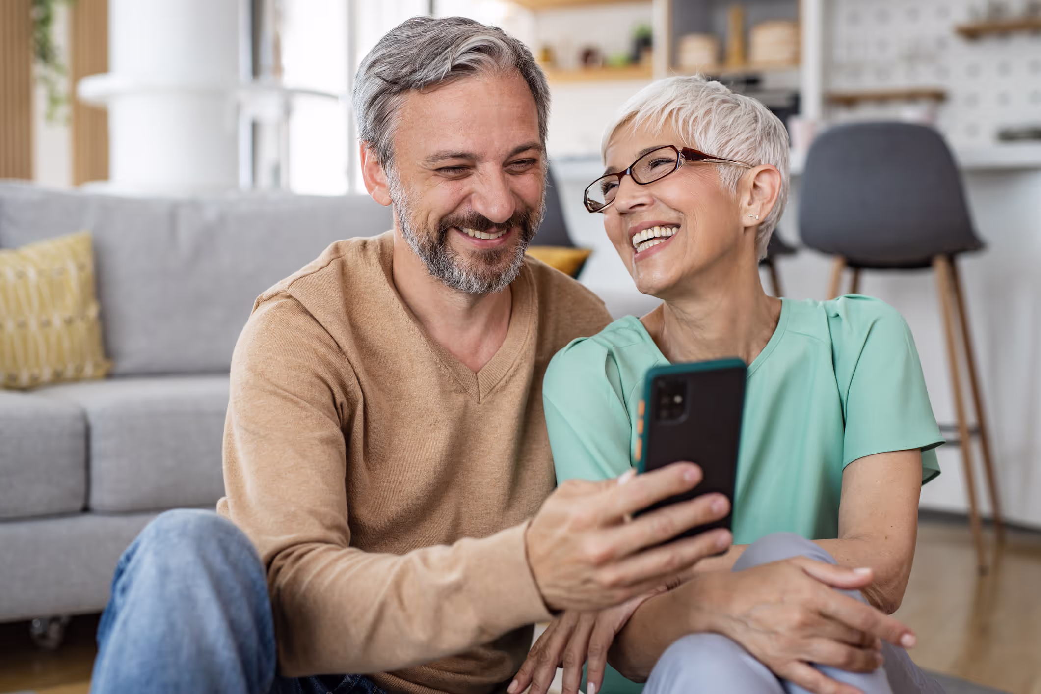 Happy couple on a phone