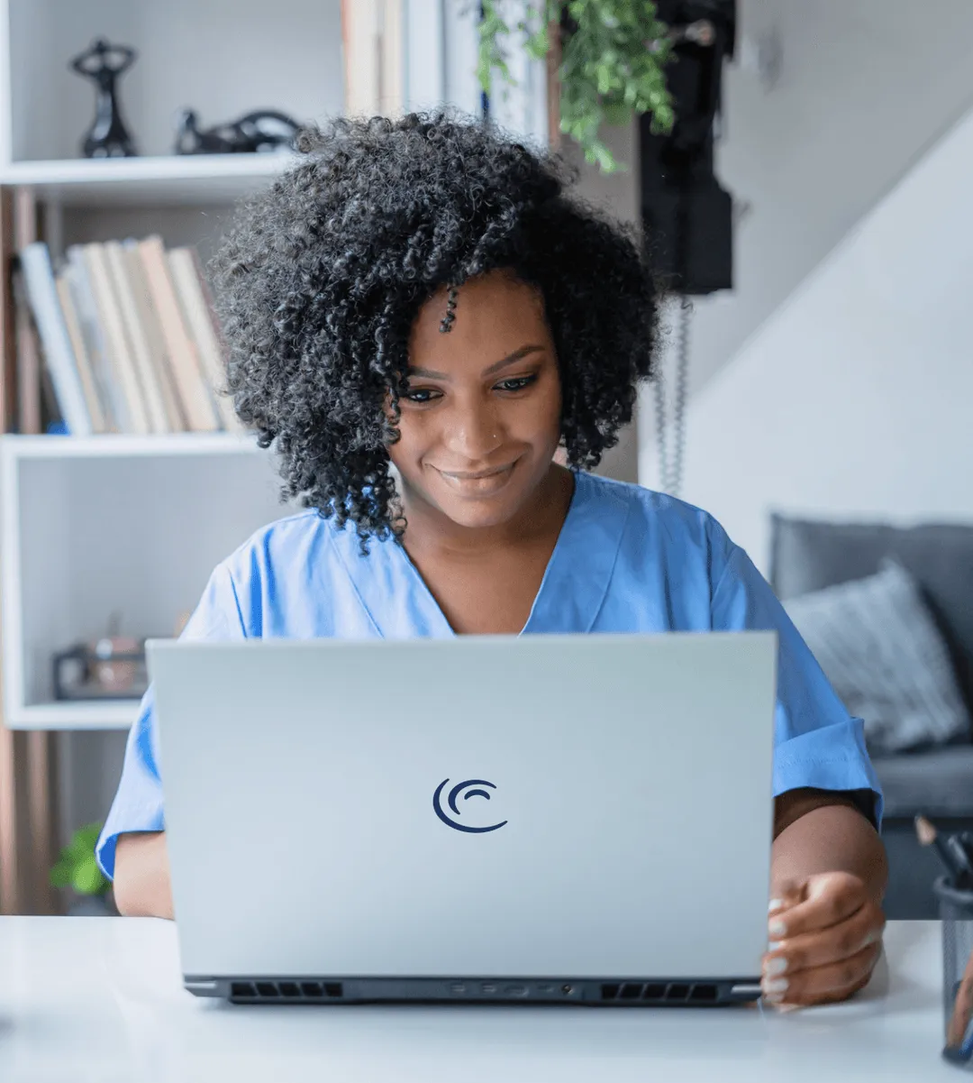 Cadence nurse works at her laptop