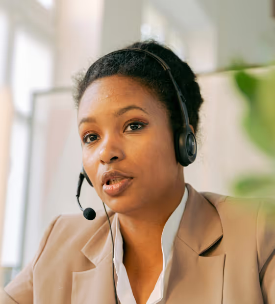 Woman with headset calls patient