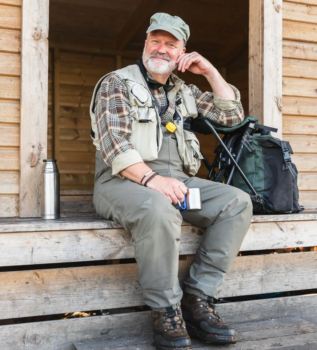 Man sits pensively on porch