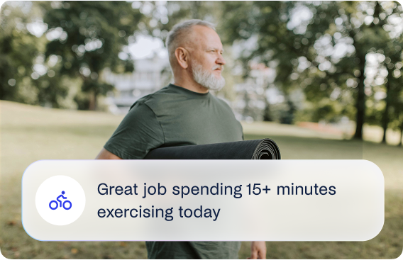 A man doing yoga, motivated by a message from his Care Team
