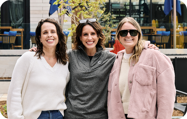Three Cadence colleagues outdoors