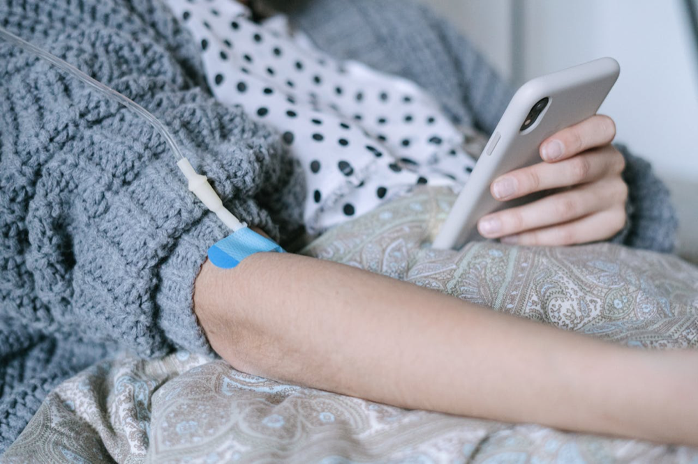 Patient recovering in hospital bed